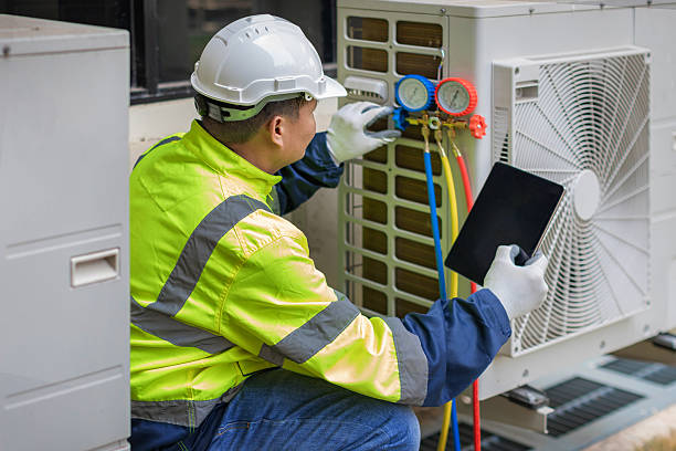 Professional Hvac technician working in Huntsville, TX